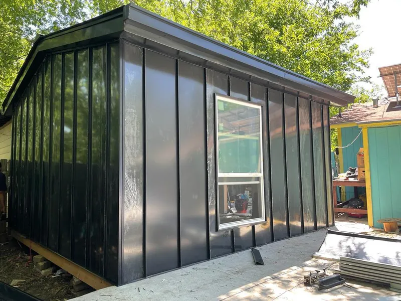 Black standing seam metal wall panels for Metal Roof Installation in Guilderland