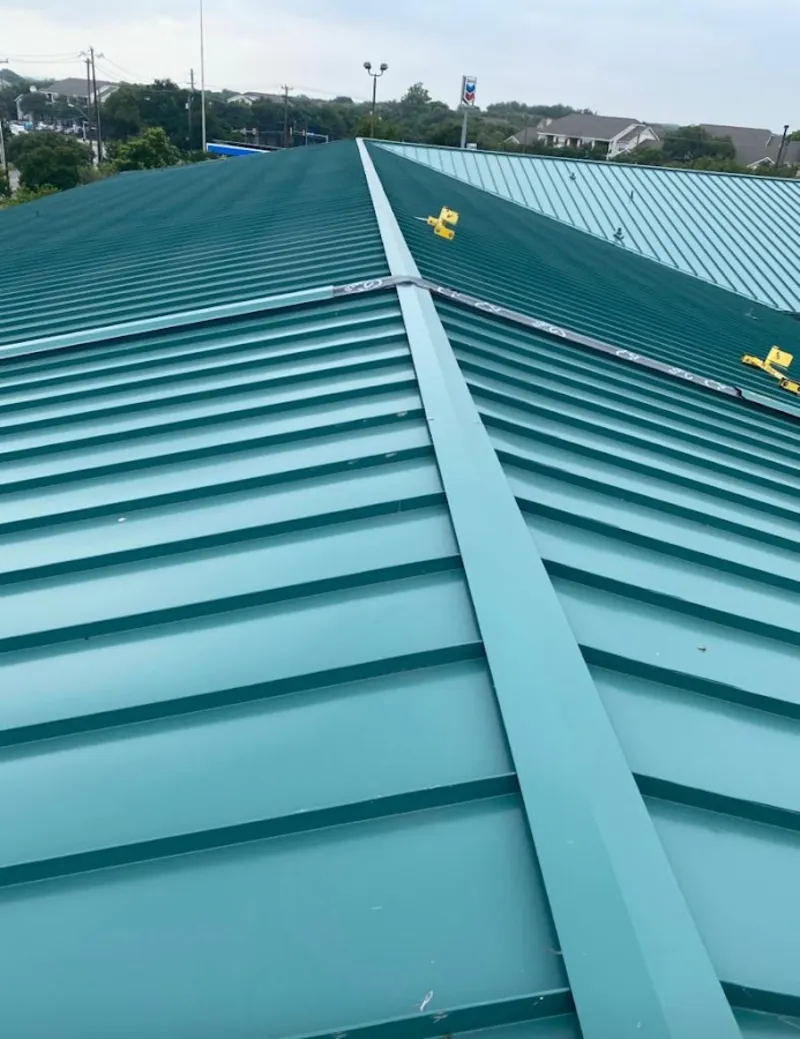 Green commercial metal roof ridge and valley for Metal Roof Repair in Guilderland