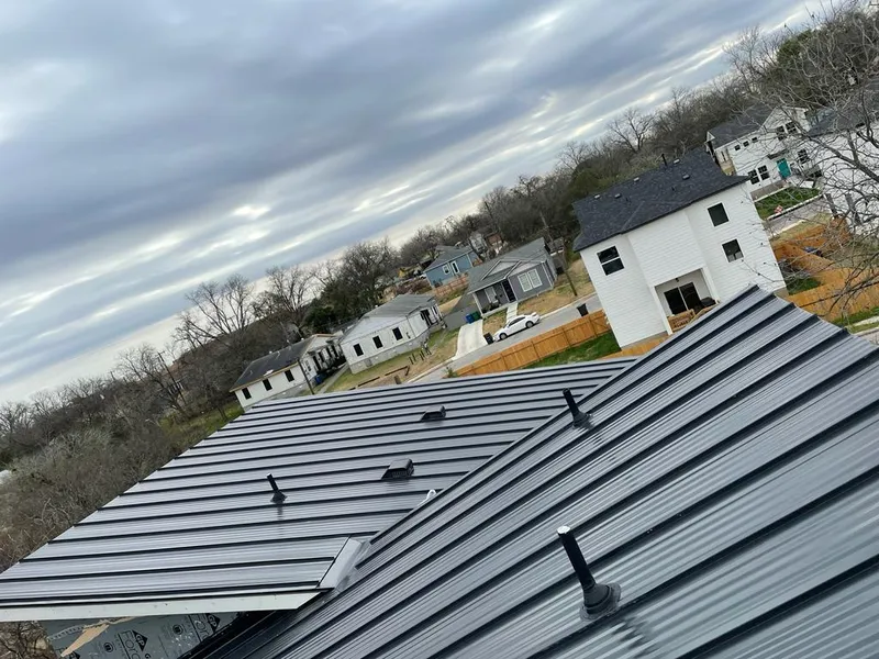 Standing seam metal roof panels with vents for Skylight Repair in Guilderland
